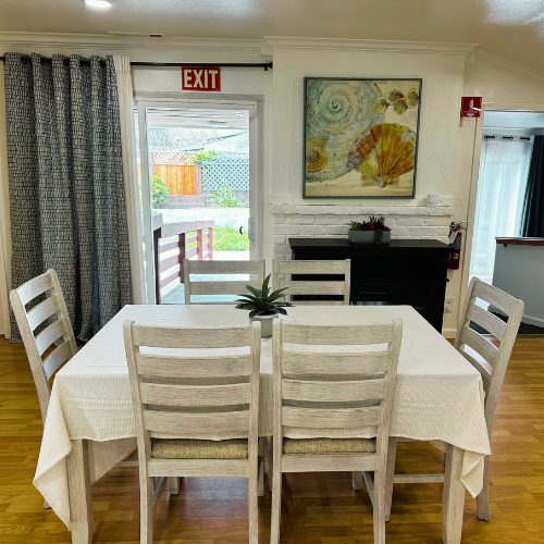 Bright dining room with set tables