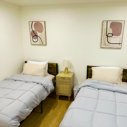 Shared bedroom with two beds